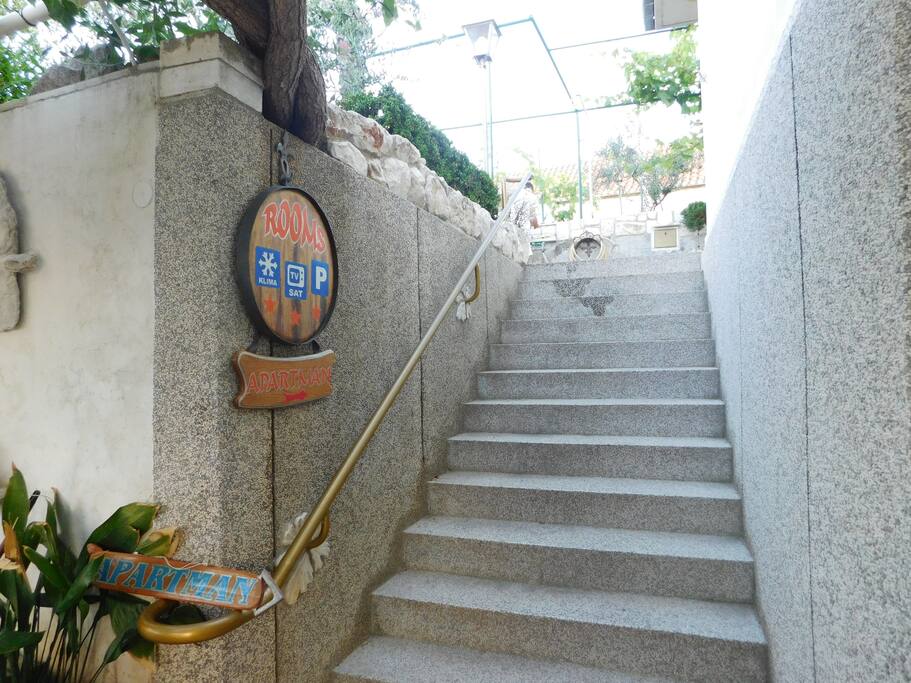 Apartment is located upstairs