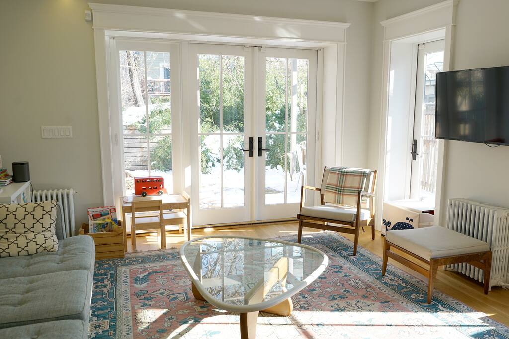 Sitting area, doors open to backyard patio