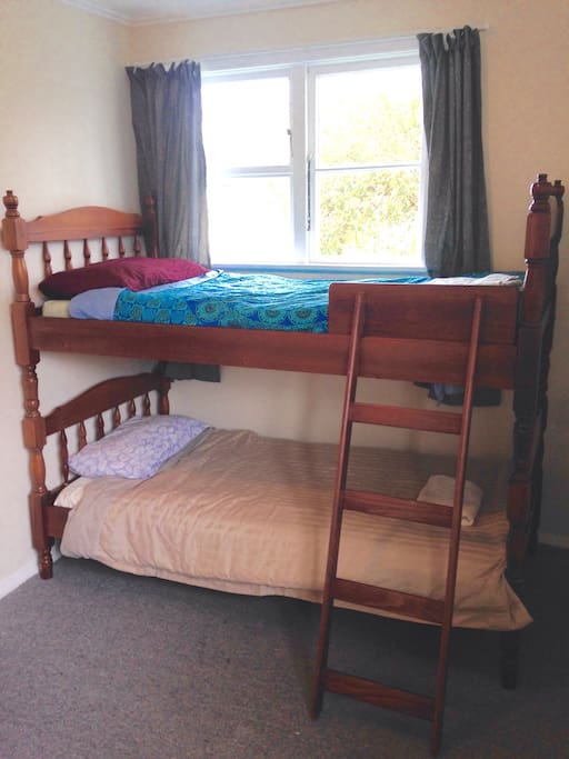 Guest room number two with Victorian style wooden bunks
