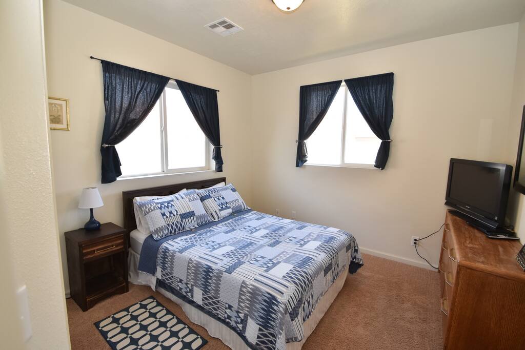 Navy Room: Queen bed, closet, dresser, night stand, TV