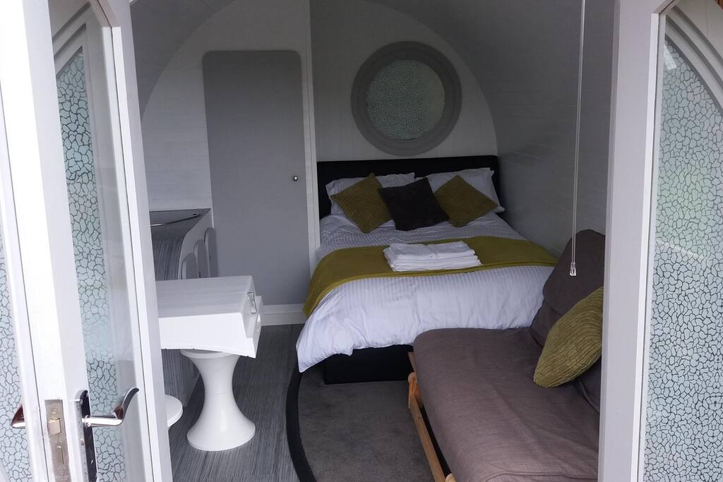 Double bed, futon and en-suite shower room.