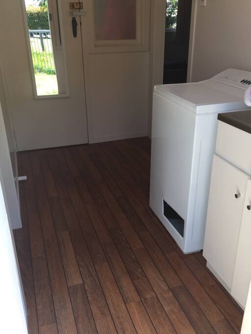 Laundry. Washer. Tub. Full length mirror. Hairdryer. Straighteners.
