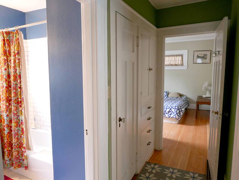 Hallway from your guestroom to shared bathroom.