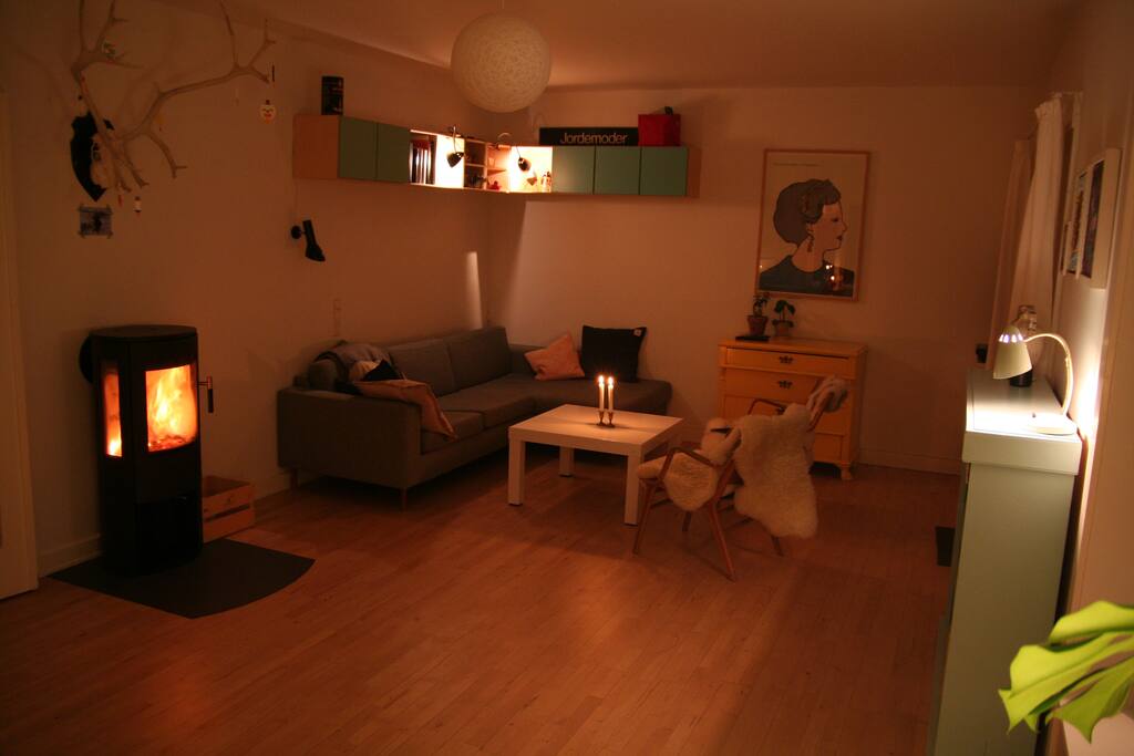 Living room at night - you can light up the woodburning stove if you want to. Wood is for free.