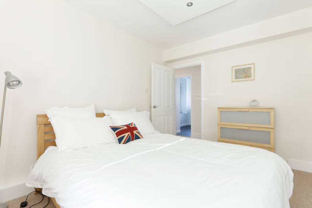 Super comfortable Queen sized bed with high thread count sheets.