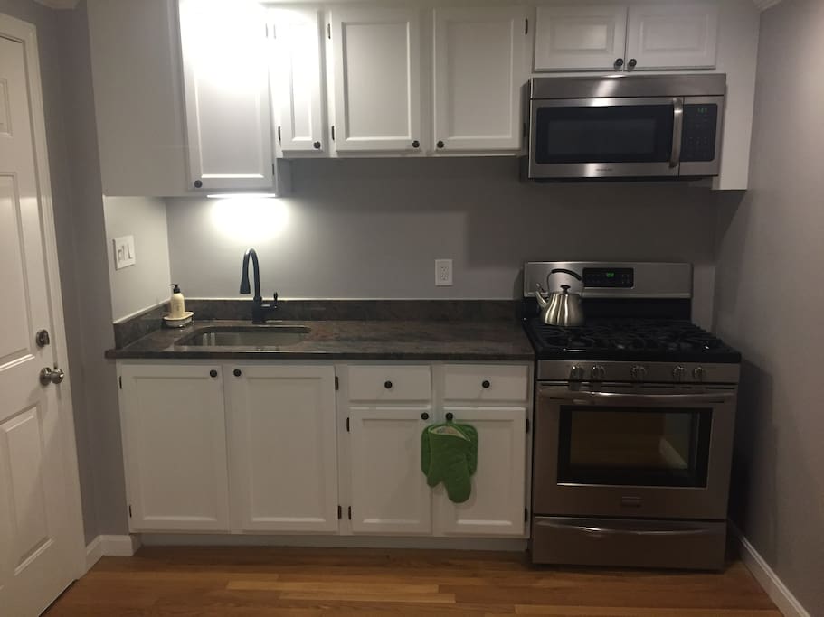 New Stainless Steel appliances. Kitchen is fully stocked with plates, glasses, utensils, etc