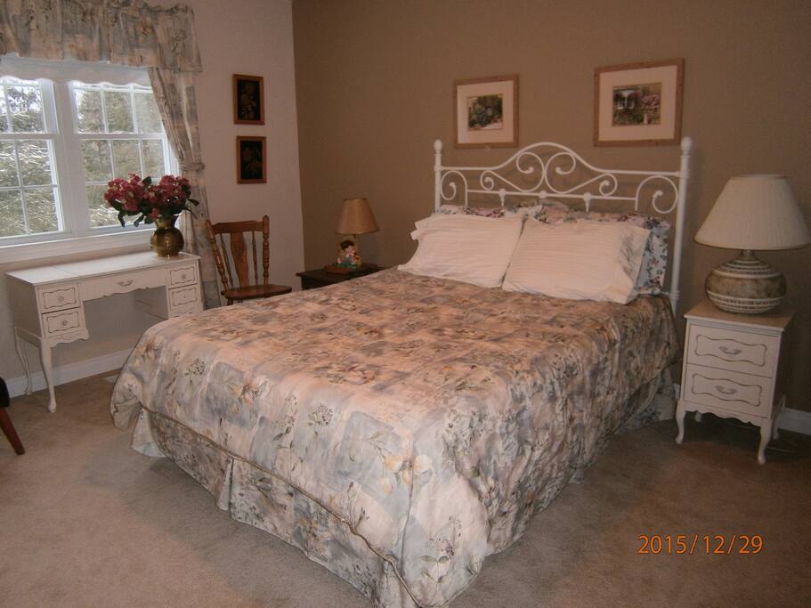 The Floral Room has one queen bed