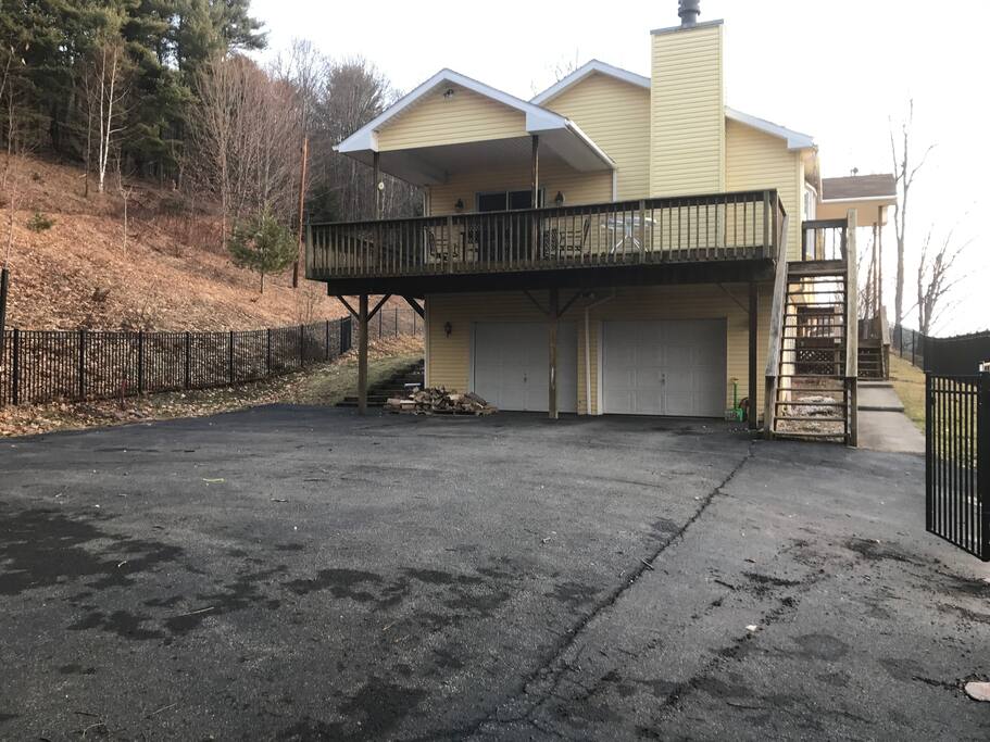 Parking area/ house/ grass yard is behind (all fenced in)