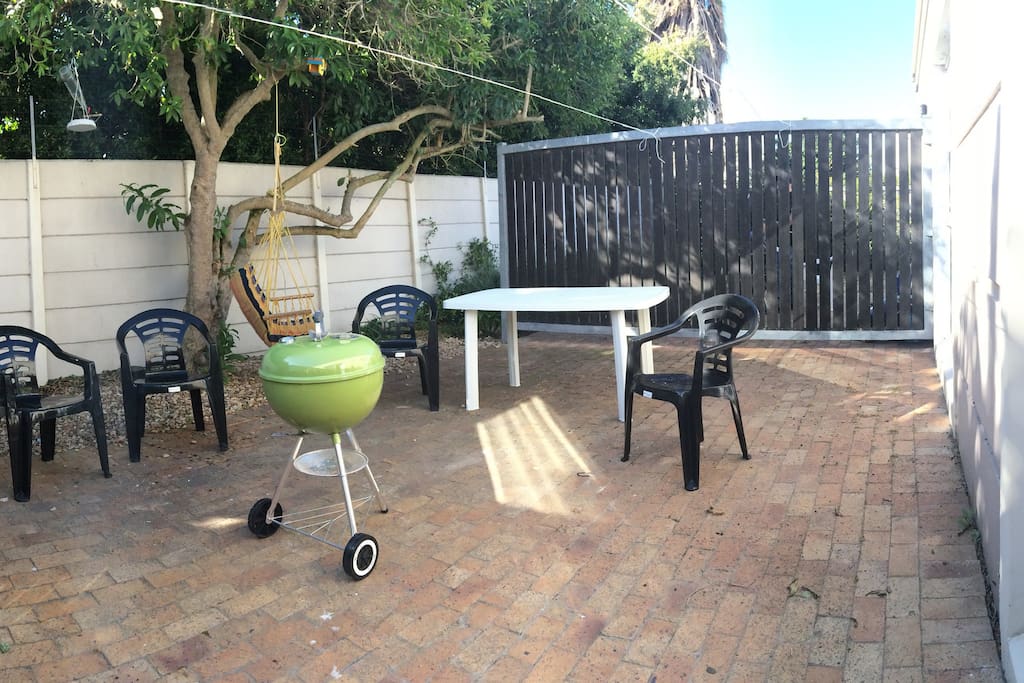 Outside braai area surrounded by birdsong