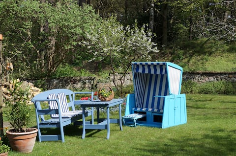 Erfolgreiche Airbnb-Immobilie: Cozy apartment with garden in peaceful location in Heringsdorf