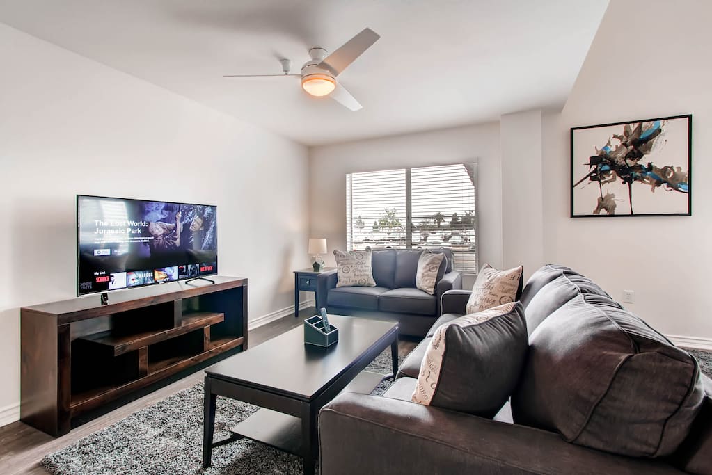 Sit back and relax in the chic living room with 55" HDTV featuring free Netflix and WIFI