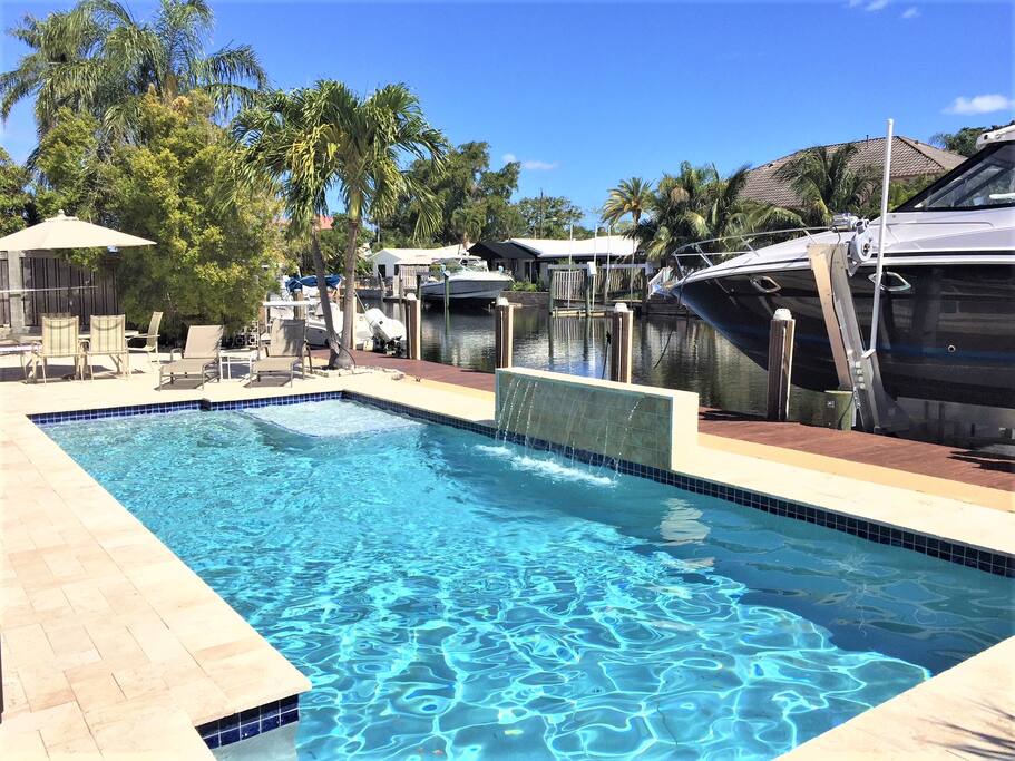 Pool area overlooks picturesque waterway.