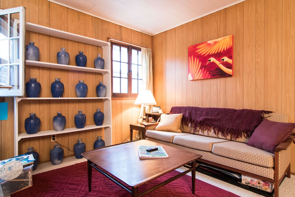 Attached living room in upstairs suite