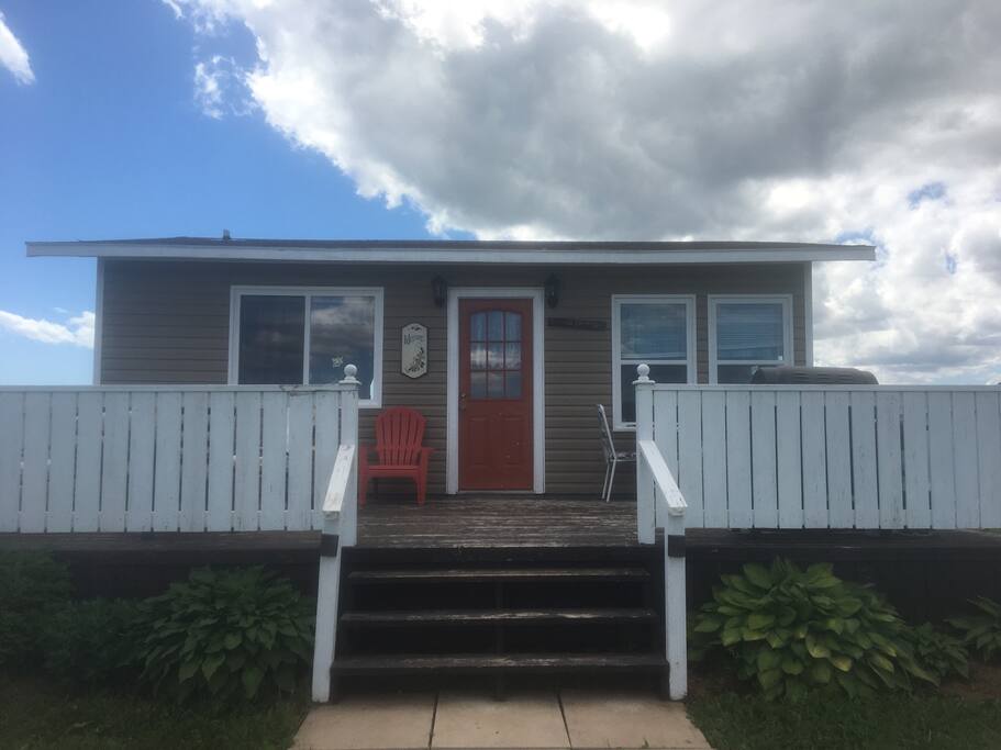 This is the front view with large deck facing Johnston's River!!