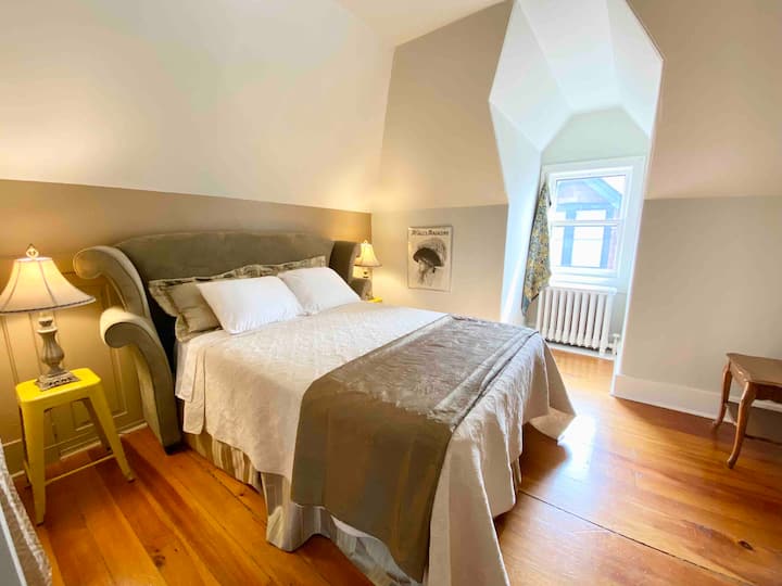 Third floor bedroom; queen bed.