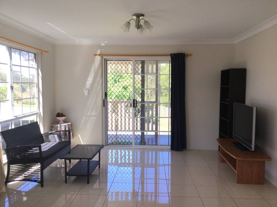 Living area inside the Granny Flat - working TV with plenty of sitting area.