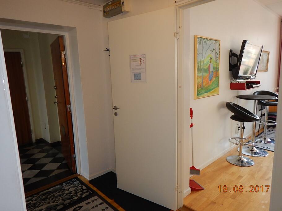 When you get up the last staircase, the apartment's door is on the right.