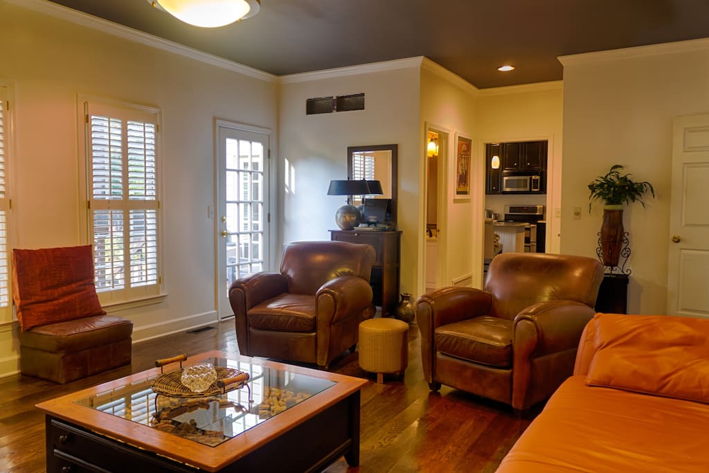 Family room extends to eat-in kitchen and French door to upper outside deck.