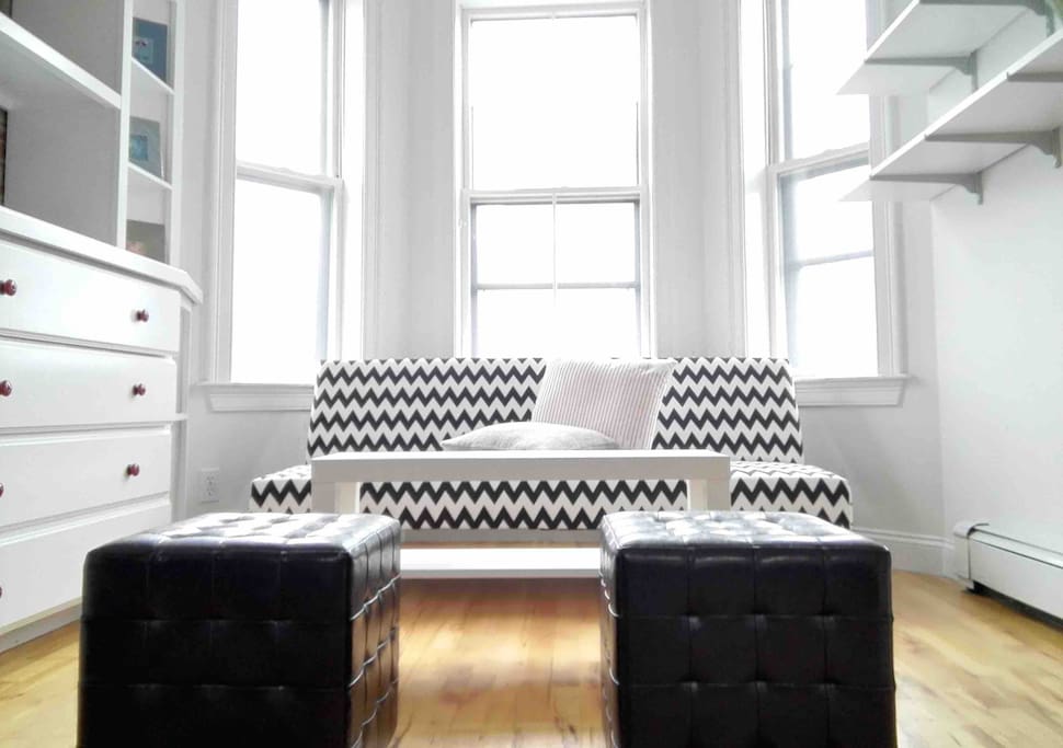 Sunny and Stylish living room with beautiful view outside the window