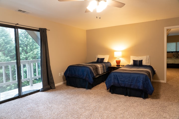Top floor large room: two twin XL beds. Perfect for kids or adults!
