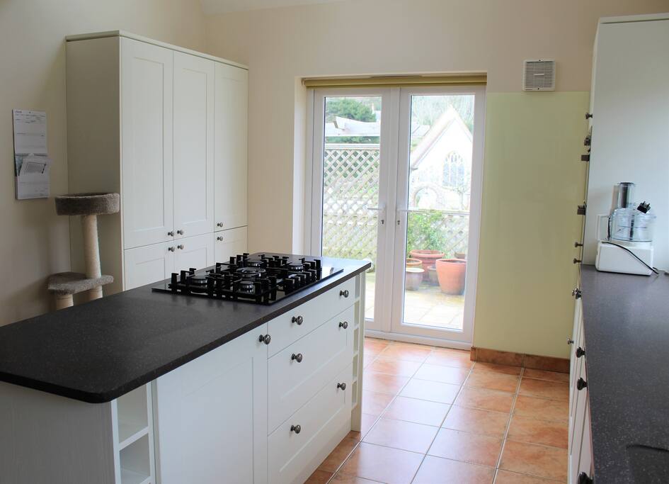 Kitchen with access to patio and outdoor seating