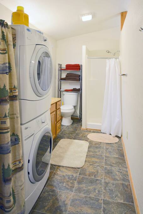 Bathroom with washer and dryer