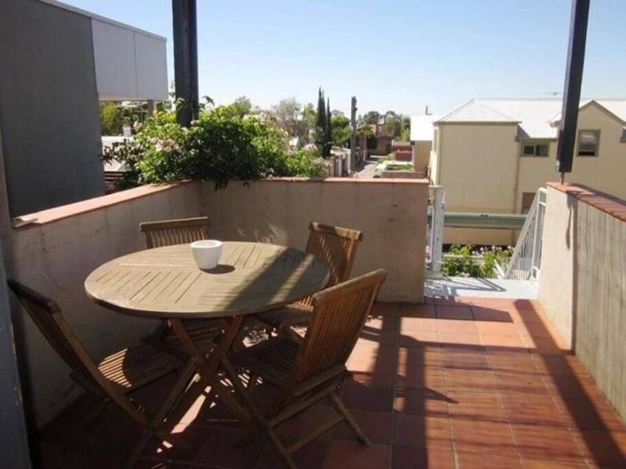 Second outdoor terrace/ bbq area complete with city views.