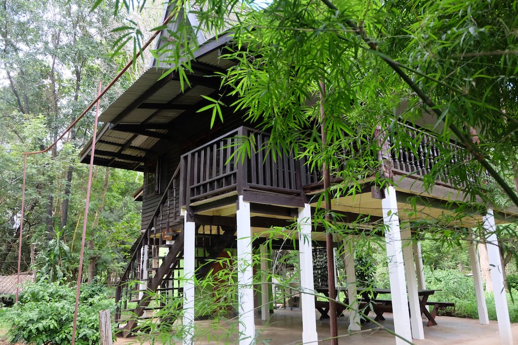 Traditional Thai styled house on high tilts with spacious use space underneath.
