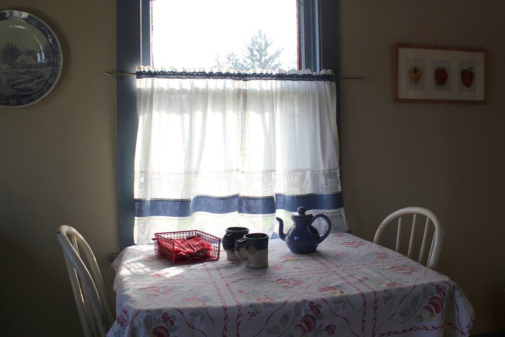 Enjoy breakfast with a cup of coffee and a view of the farm