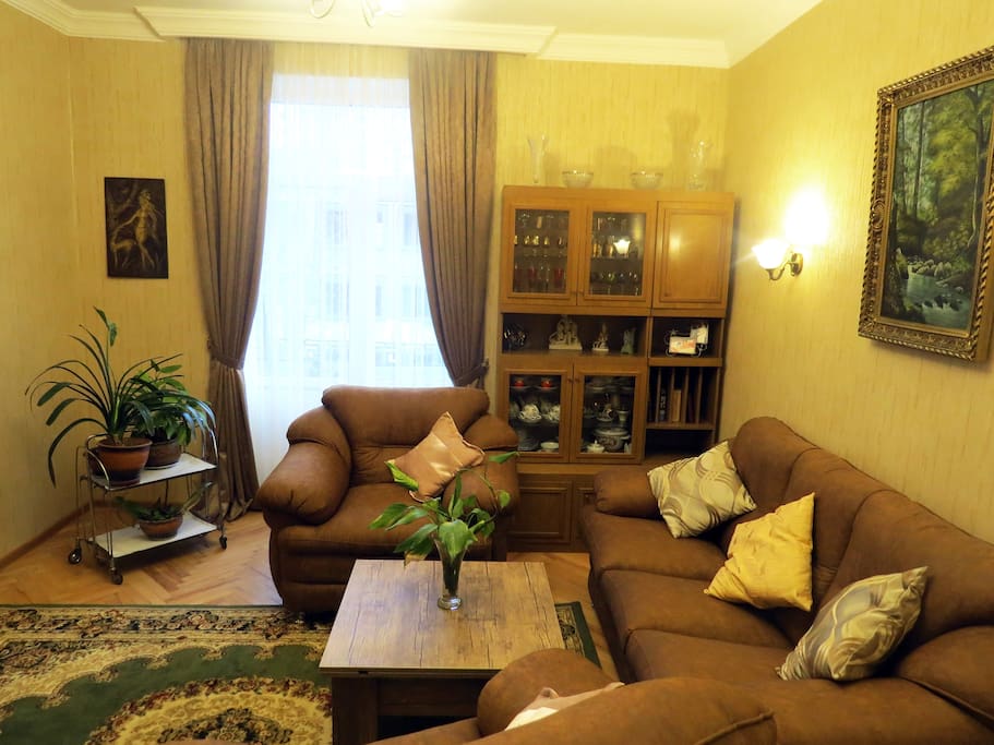 Private living room with TV and balcony