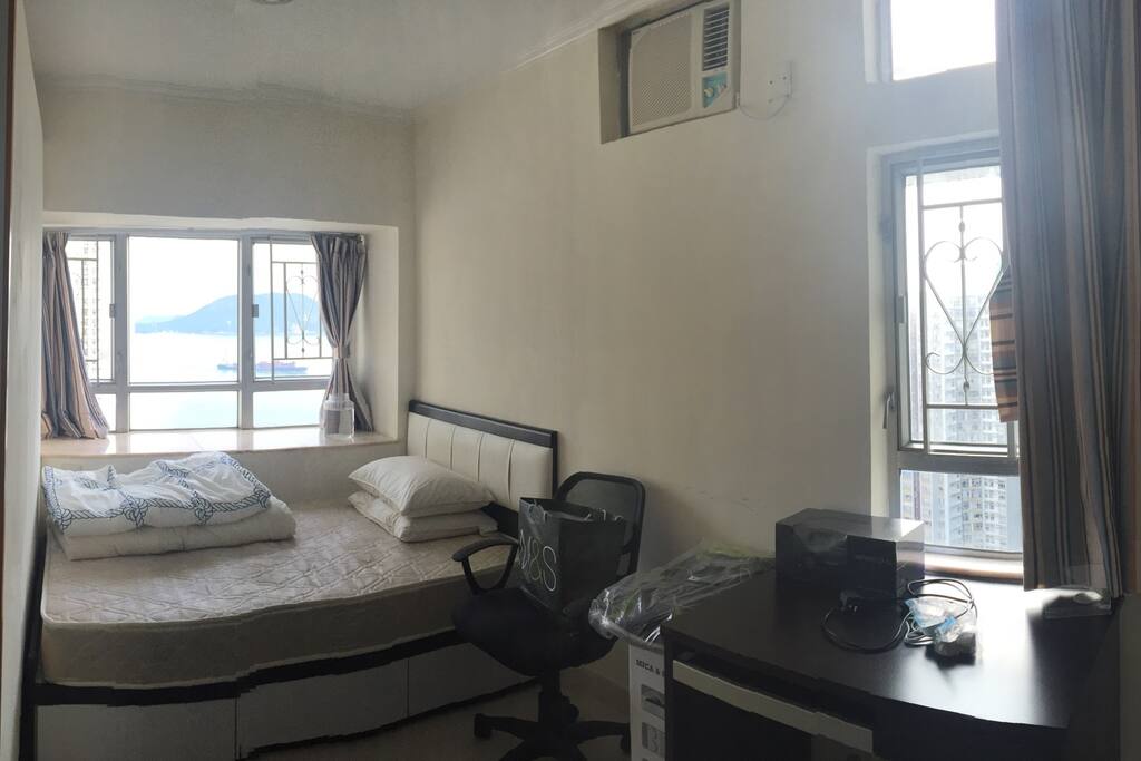 Double bed, desk, chair and wardrobe