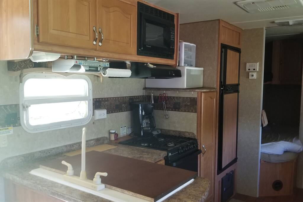You have use of the kitchen area in the camper with all the basic cookware
