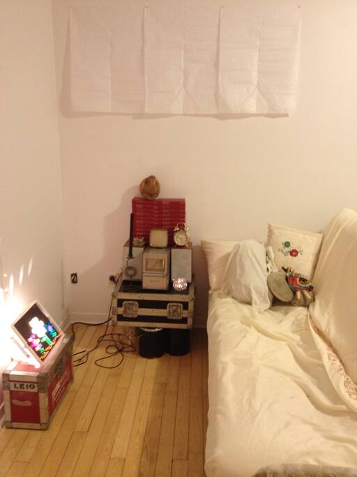 The living room: I only listen music and read, sorry I don't like t.v ! You can use this space to relax and use Internet.