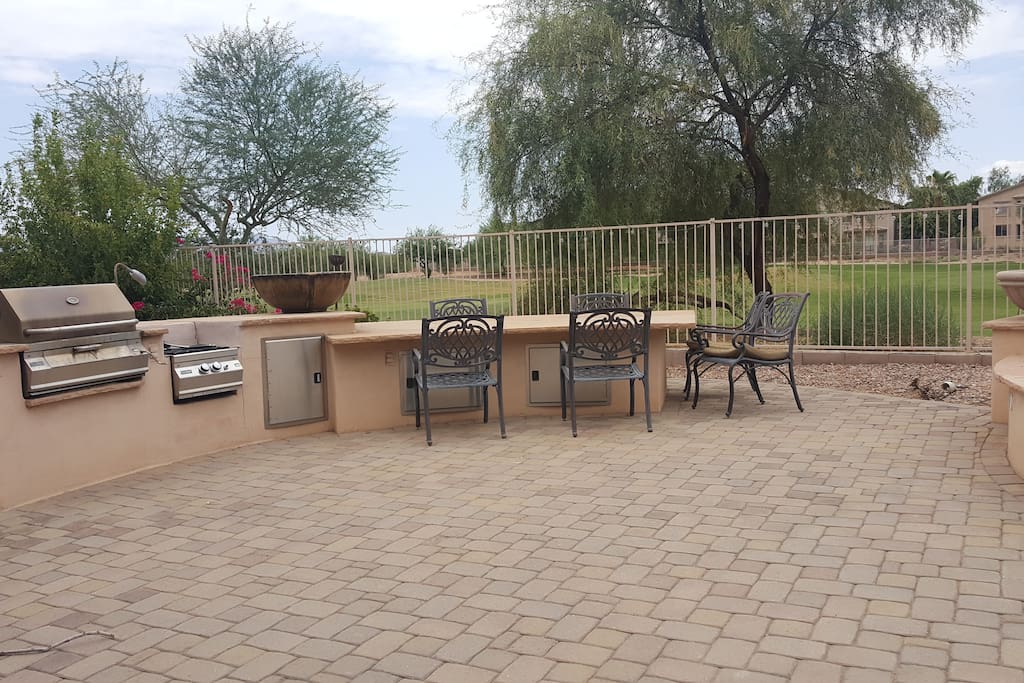 Large outdoor dining table and BBQ