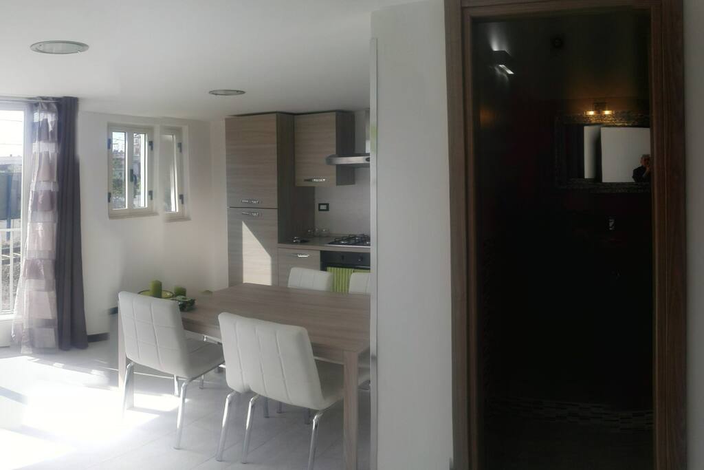 Green Apartment - living room and kitchen