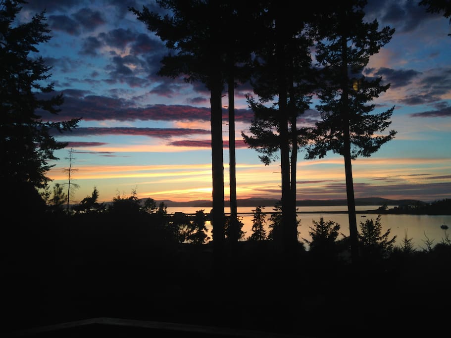 View from the deck at sunset across Fishermans Bay and San Juan Channel towards San Juan Island.