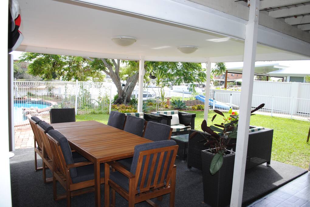 Alfresco dining and relaxation undercover overlooking Canal