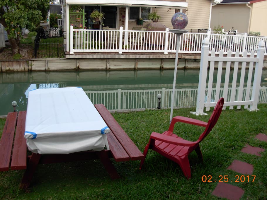 Picnic table in back yard on resaca