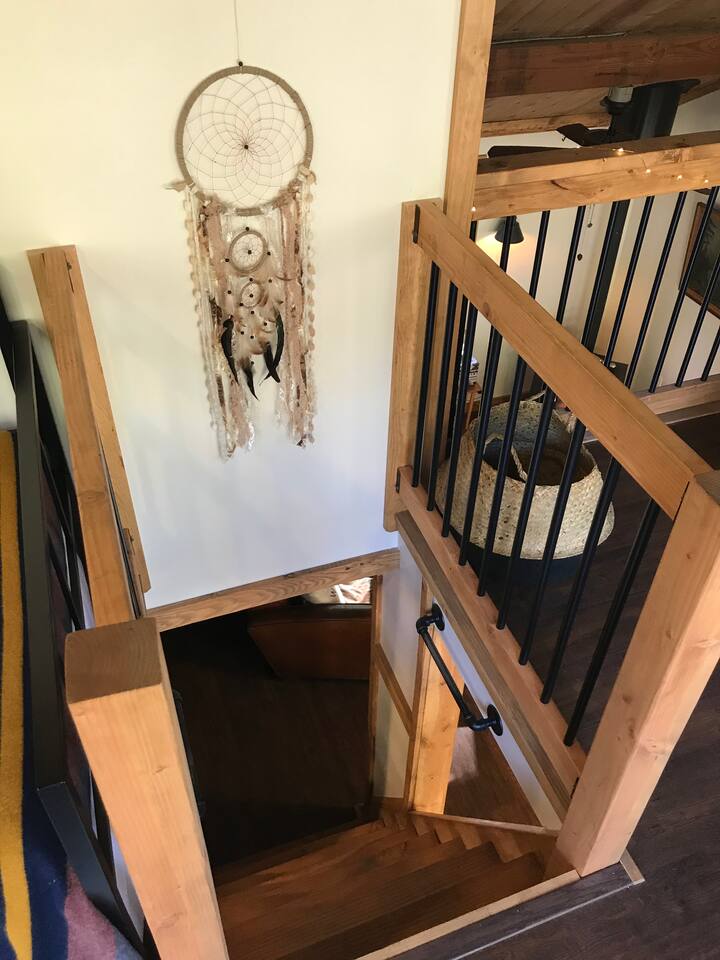 Top of sleeping loft ladder looking down.