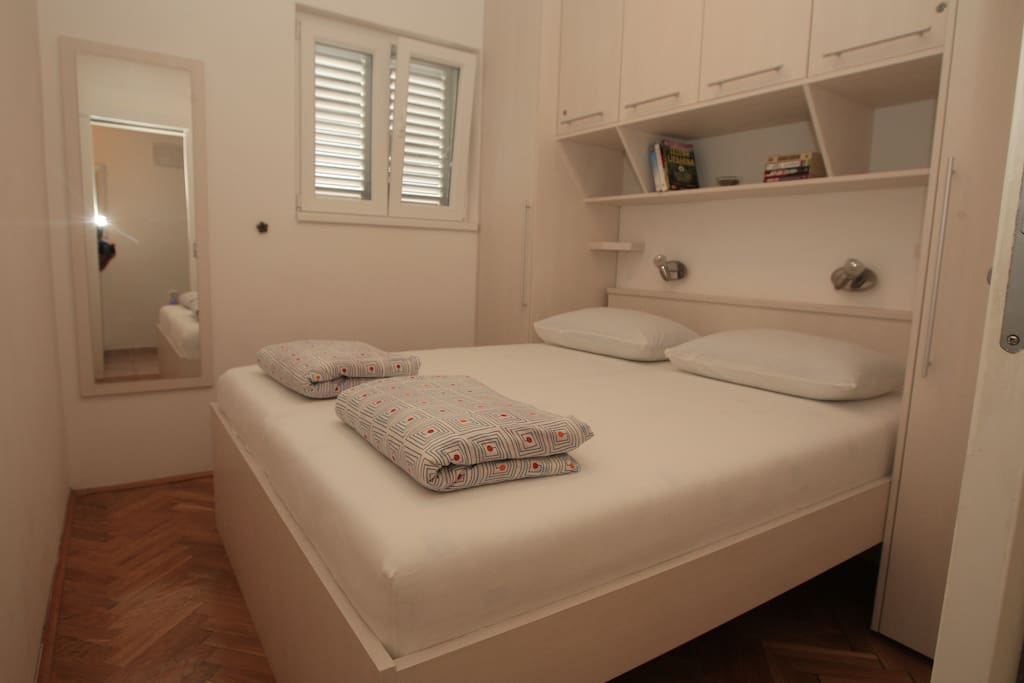 Bedroom 2/2 - double bed, small room but plenty of storage and ceiling fan for the warm nights