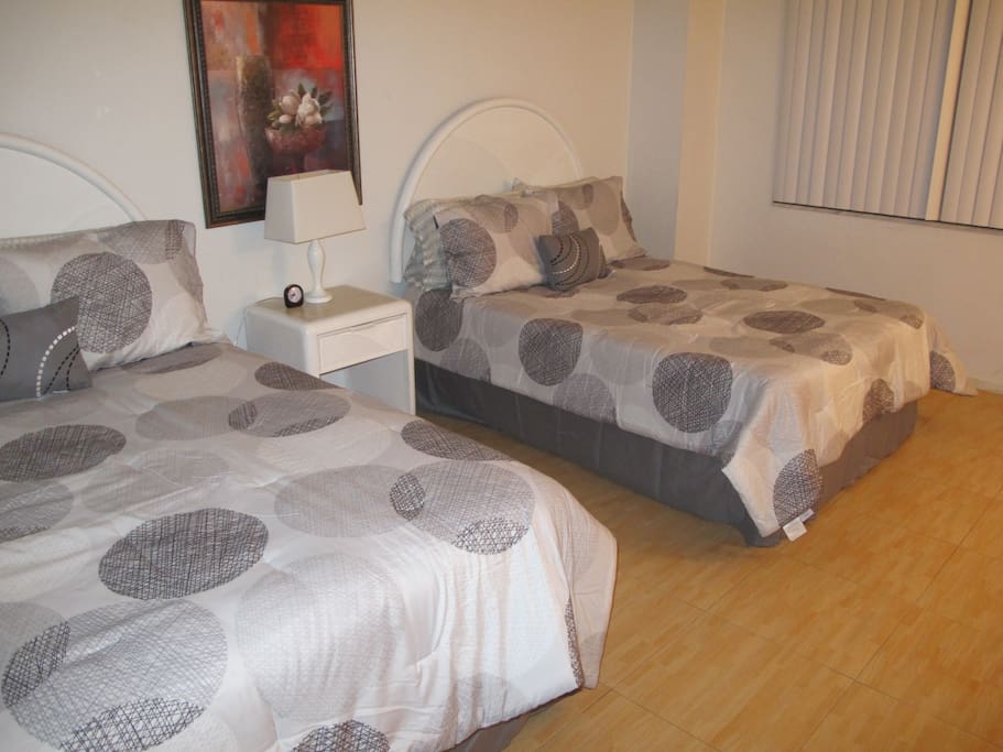 2 queen size beds with plenty of walking space