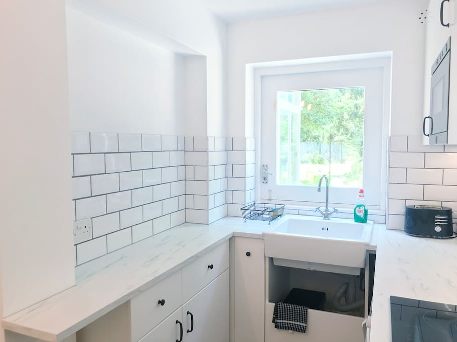 Kitchen with oven, hob and microwave. Breakfast provided- cornflakes and muesli