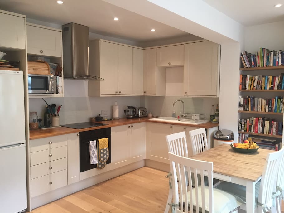 Modern kitchen with dining room table