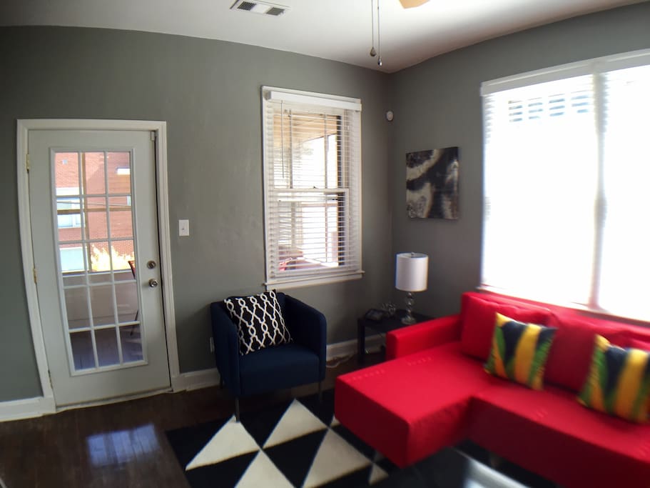 Living room, with door to screened porch