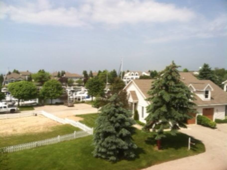 View from decks of harbor and volleyball court & playground