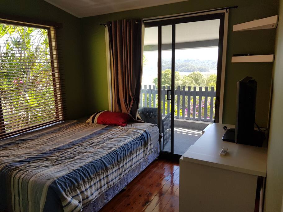 Queen bed and private verandah in 2nd bedroom with desk and tv for netflix or chromcast