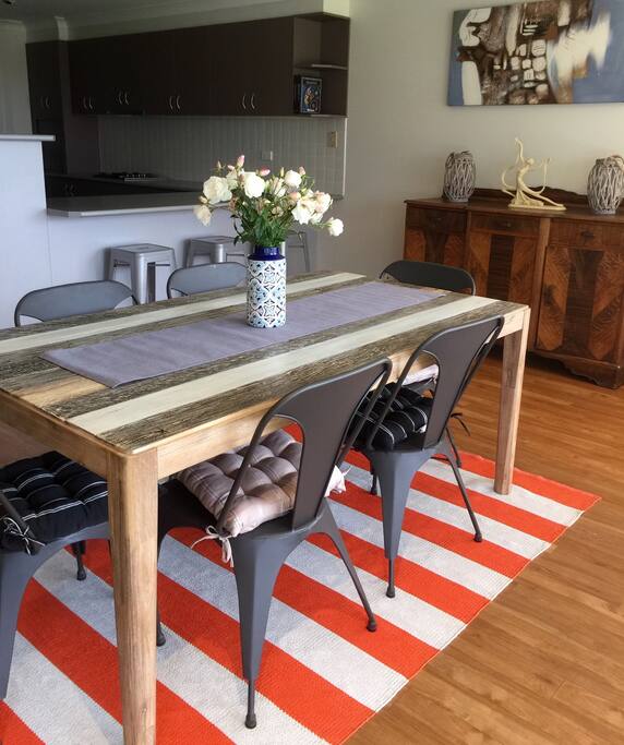 Dining table seats 6. Room overlooks backyard.