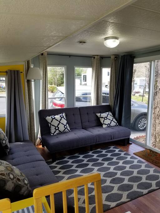 Two futons so the kids can sleep in their own space