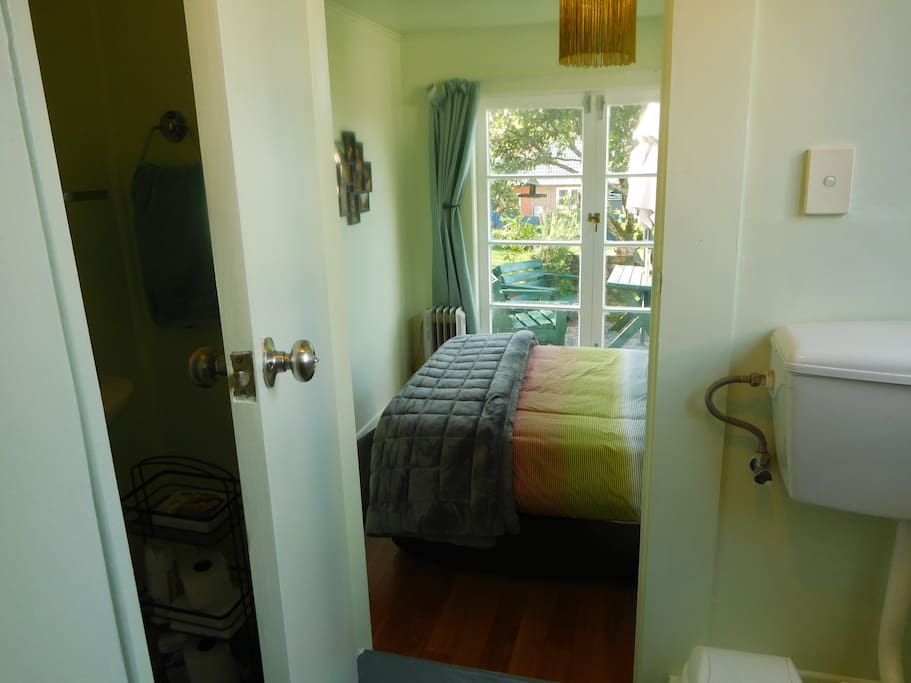 Bathroom area leading into bedroom