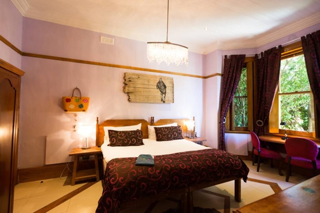 Spacious bedroom with bay window